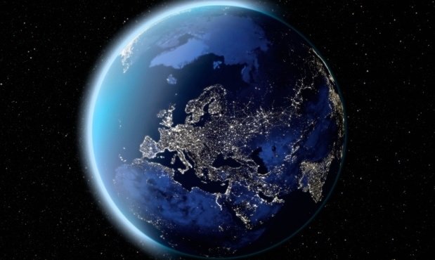 Planet Earth at night showing the European continent with city lights